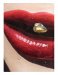Lips I 2005. Oil on aluminium pill packet with empty, painted capsules coated in gold leaf. Cast in fibreglass on perspex. 17 x 19.5cm